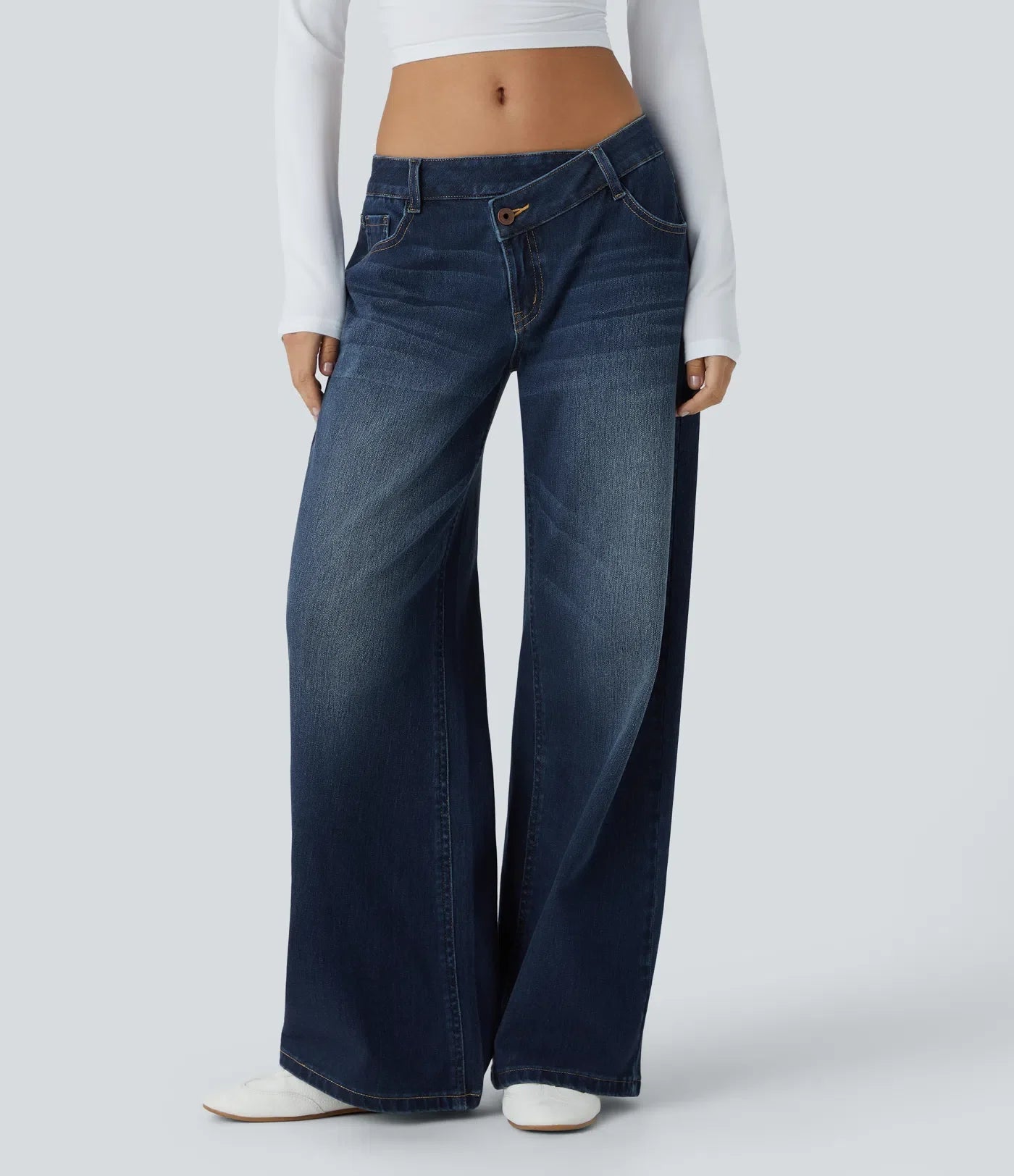 ColaFlex™ Low X - Jean a vita bassa con chiusura a bottone e zip, tasche multiple a gamba larga
