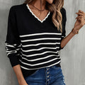 Maglione casual a righe nero e bianco